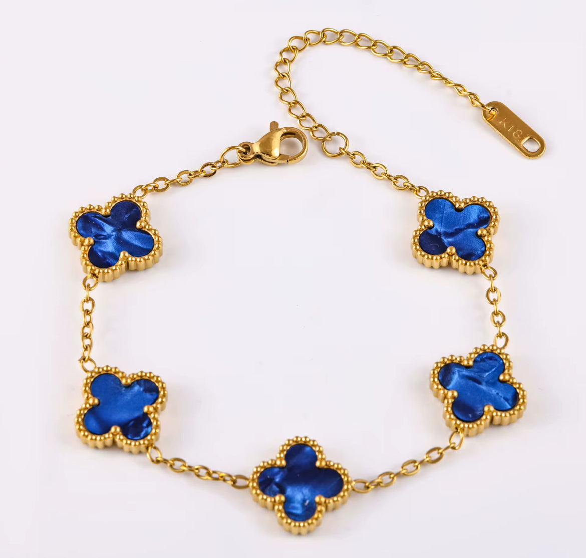 Bracelet Bleu Rayonnant en base argent 925 et plaqué or 18k, trèfles nacrés étincelants