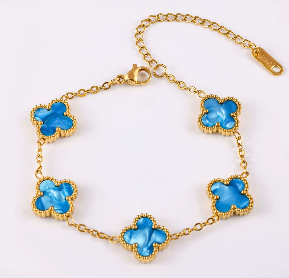 Bracelet Bleu Rayonnant en base argent 925 et plaqué or 18k, trèfles nacrés étincelants