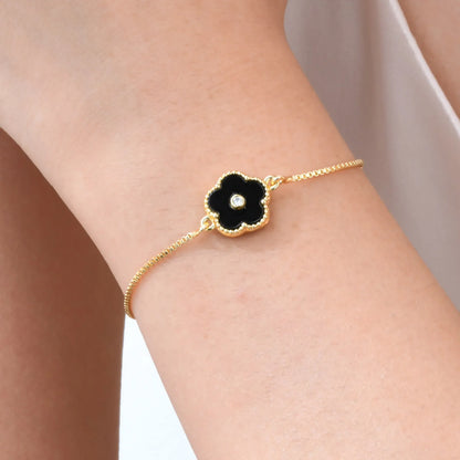 Bracelet Noir Élégance Simplement Dorée